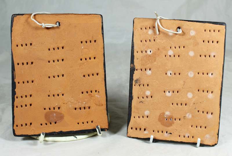 Pair of pottery tiles with chef's