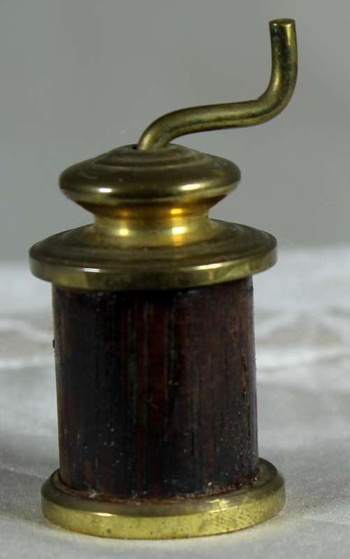 Miniature brass coffee grinder