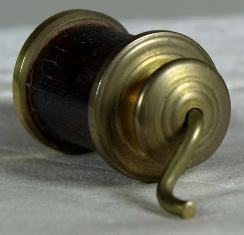 Miniature brass coffee grinder