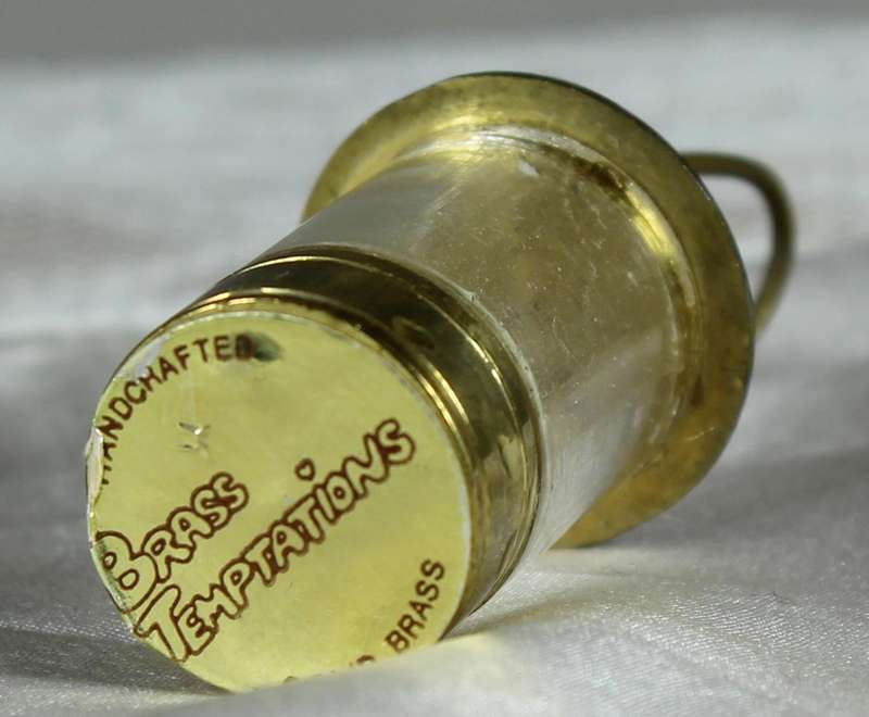 Miniature brass lamp with candle