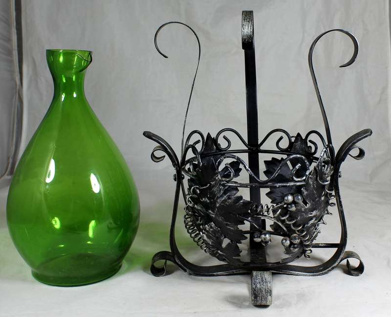 Large metal swing with green decanter