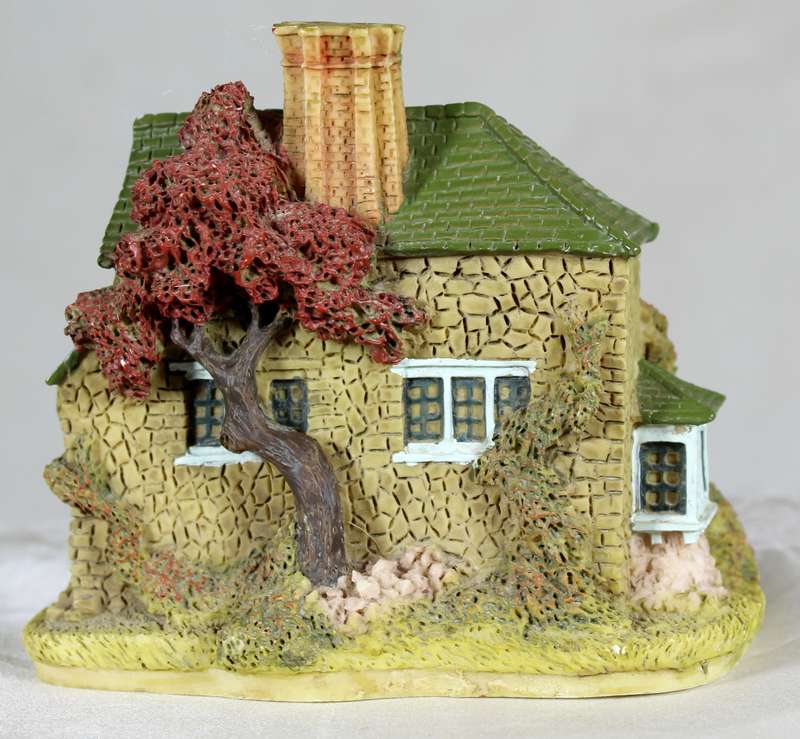 Molded house with clock