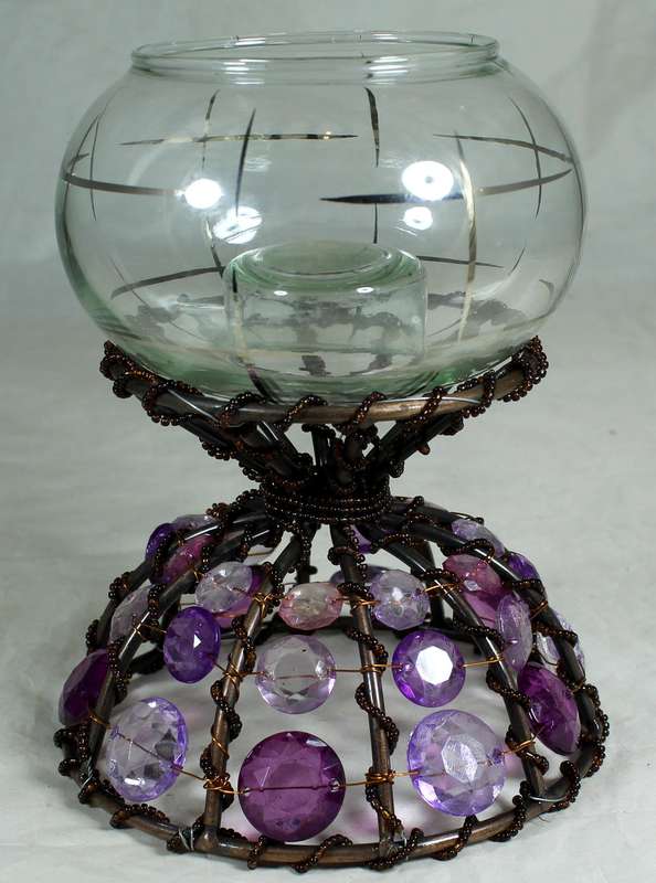 Bejeweled stand with vase