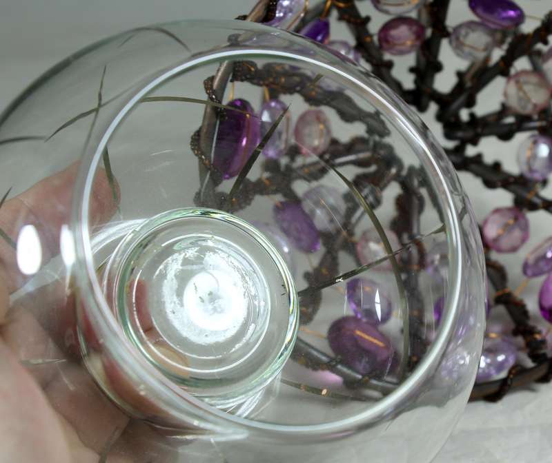 Bejeweled stand with vase