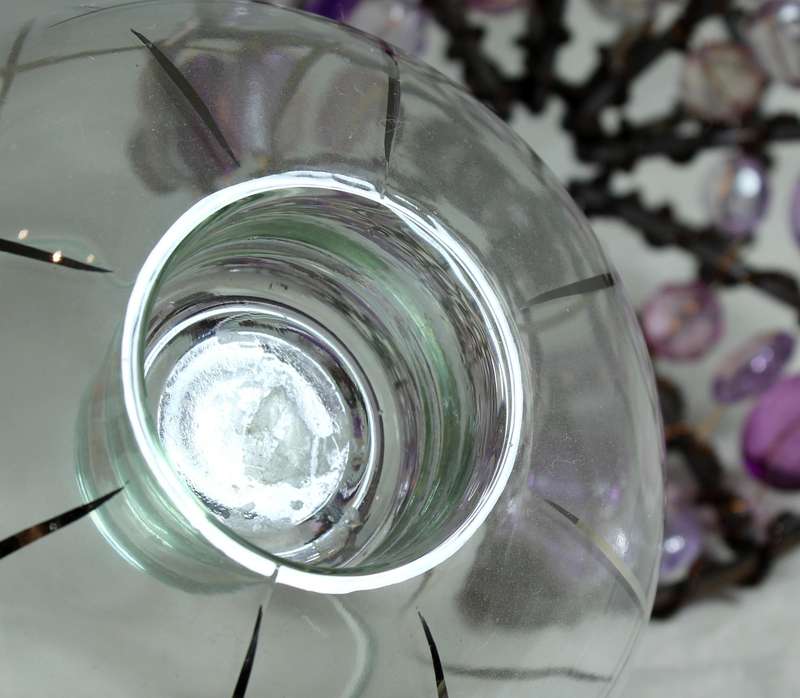 Bejeweled stand with vase