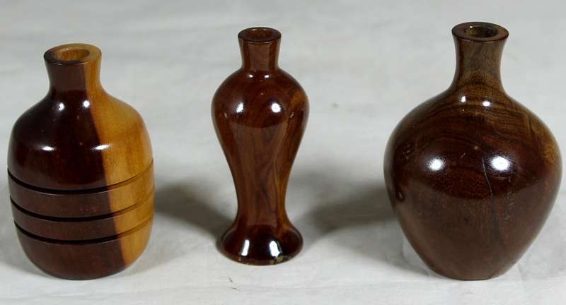Trio of miniature wooden vases