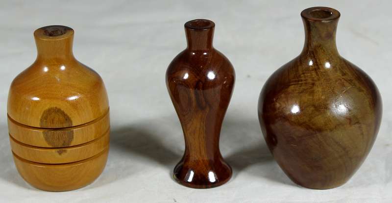 Trio of miniature wooden vases