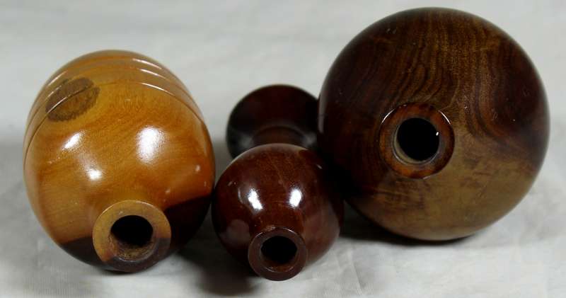 Trio of miniature wooden vases
