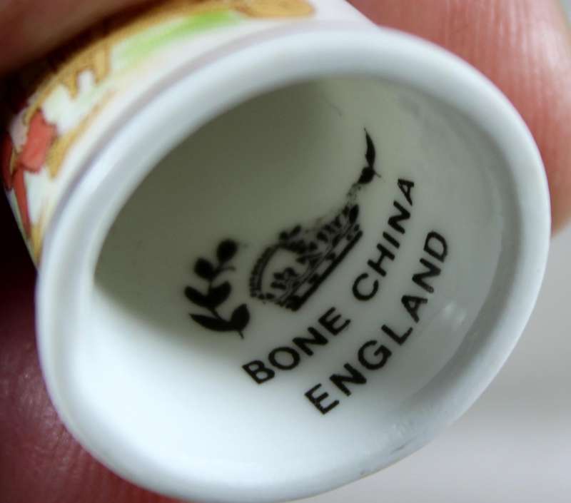 Bone China thimble - gnome pushing a wheelbarrow