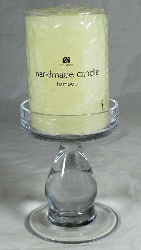 Glass stand with candle