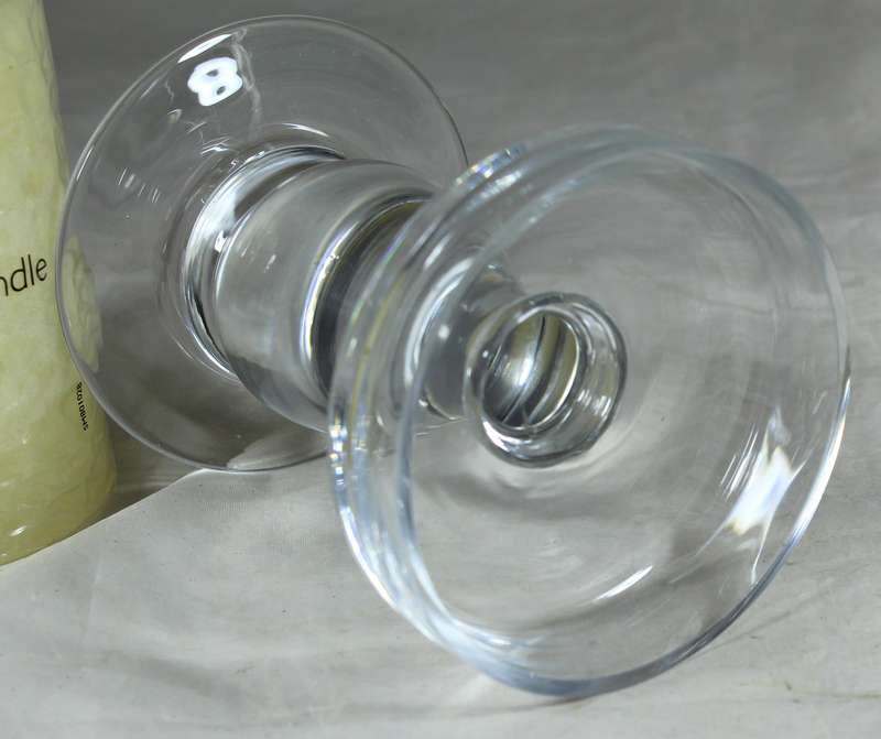 Glass stand with candle