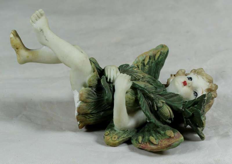 Seated little angel