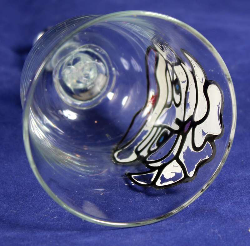 Glass bell with abstract figure