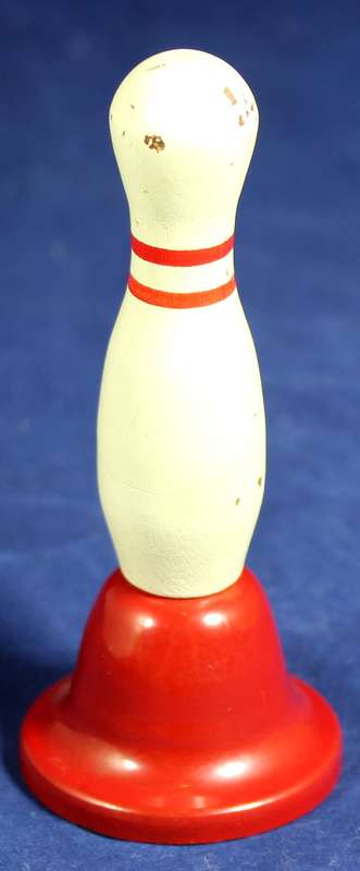 Bowling pin with metal bell