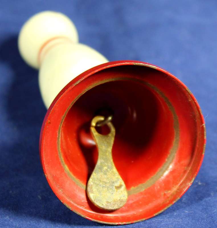 Bowling pin with metal bell
