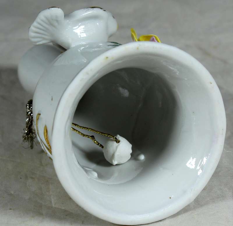 Porcelain bell with doves and yellow rose