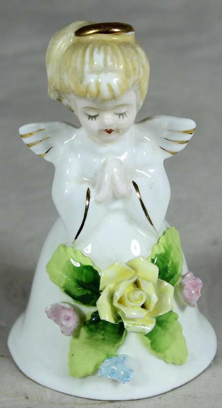 Porcelain bell - little angel with yellow flowers