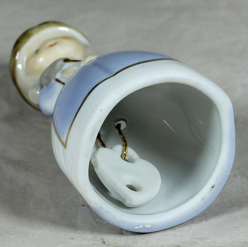 Porcelain bell - girl with hat