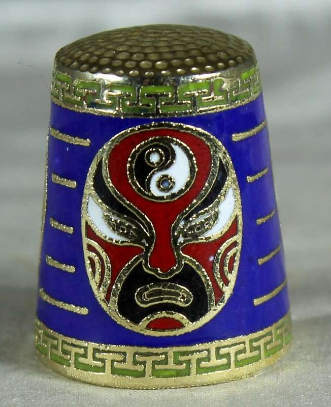 Cloissone thimble - oriental masks