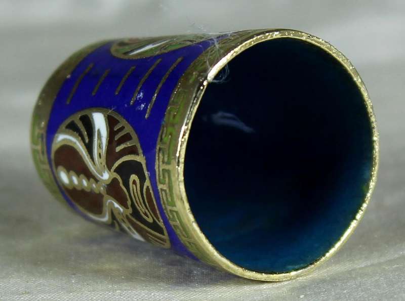 Cloissone thimble - oriental masks