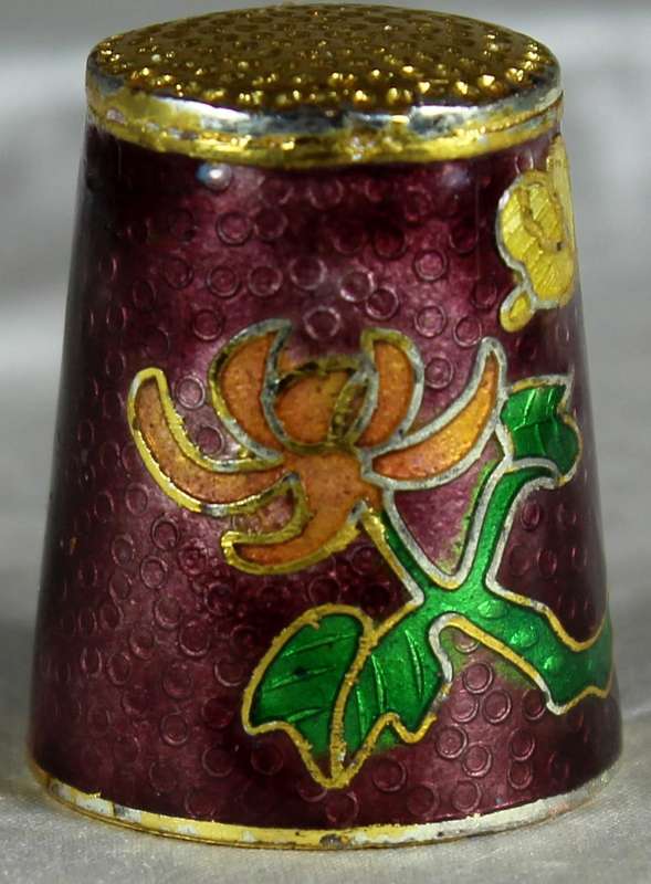 Cloissone thimble - orange flowers on a brown base