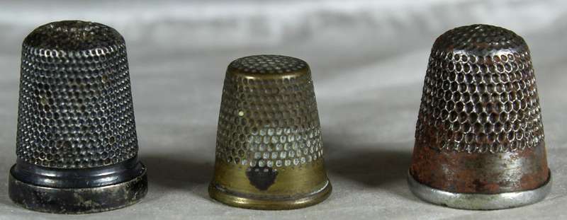 Three metal thimbles - Some rusty