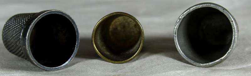 Three metal thimbles - Some rusty