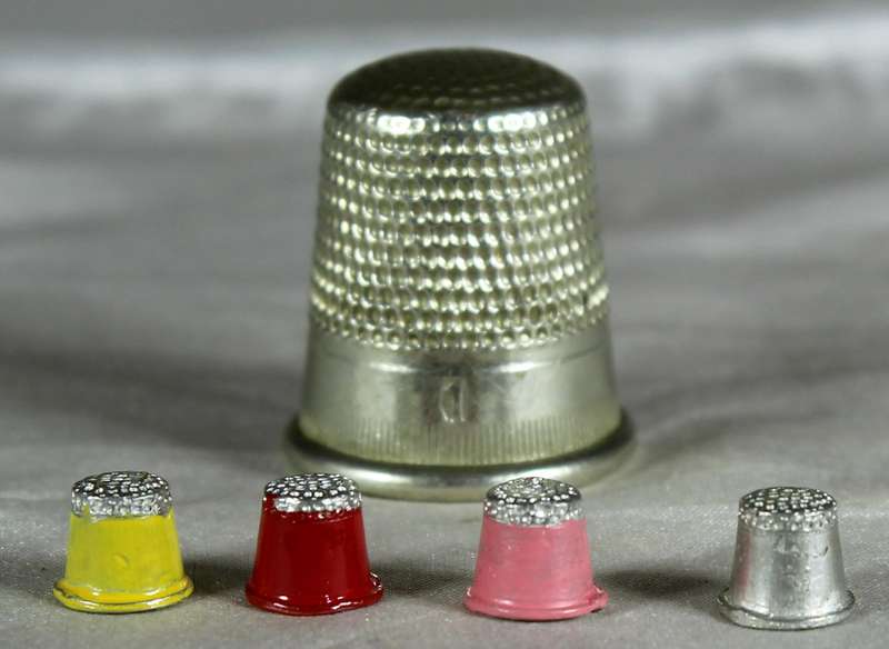 Set of 4 micro miniature metal thimbles