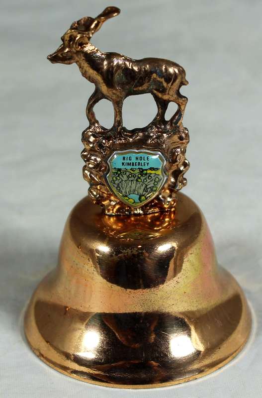 Souvenir copper bell - big hole Kimberley with Kudu topped figurine