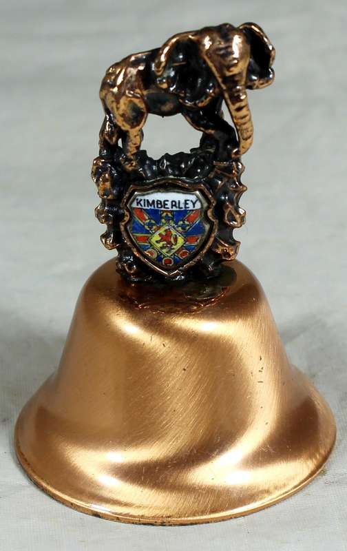 Souvenir copper bell - Kimberley with elephant topped figurine