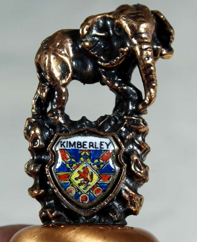 Souvenir copper bell - Kimberley with elephant topped figurine