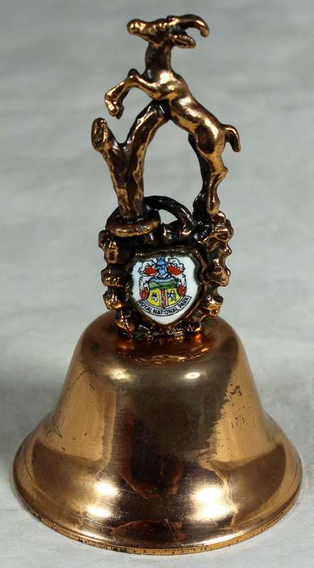 Souvenir copper bell - Royal national park with springbok topped figure