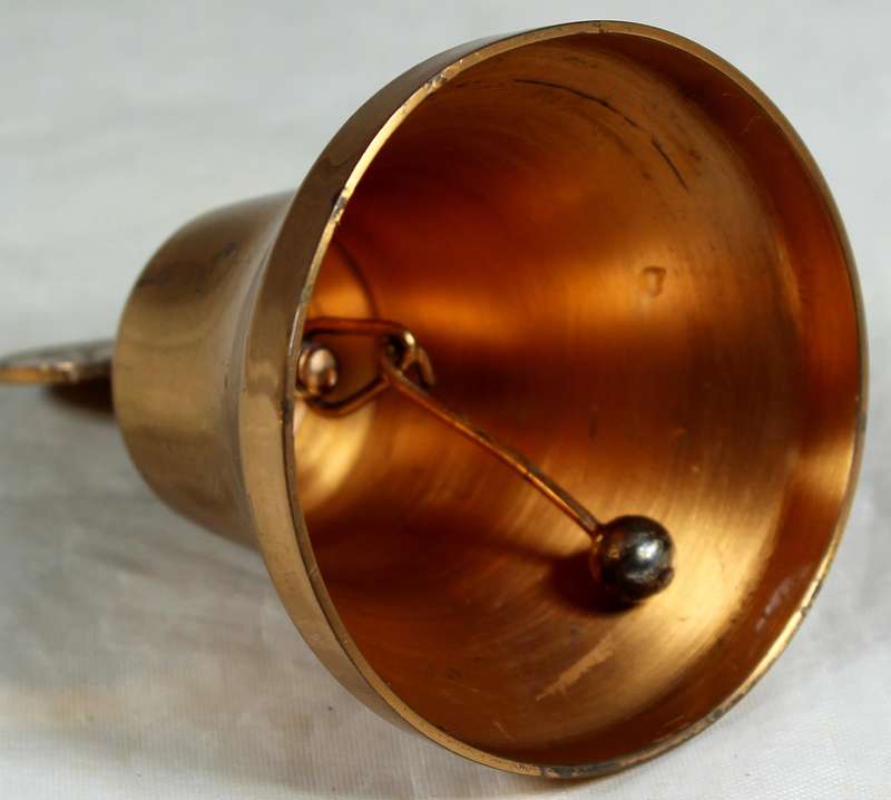 Souvenir copper bell with a Rhodesia 1c coin from 1976