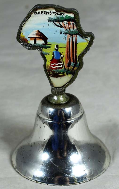 Souvenir silver plated bell - Queenstown with map of Africa