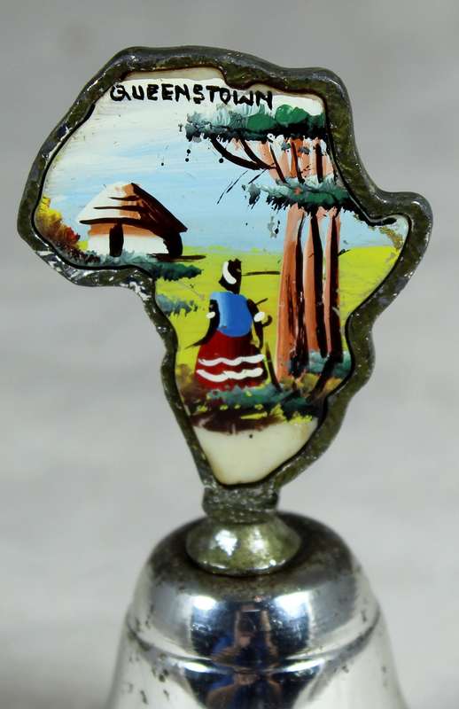 Souvenir silver plated bell - Queenstown with map of Africa