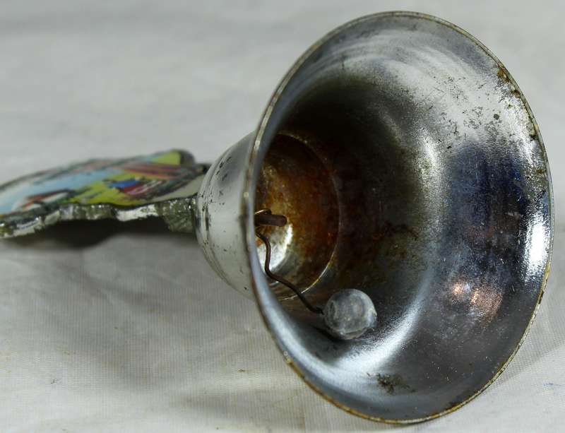 Souvenir silver plated bell - Queenstown with map of Africa