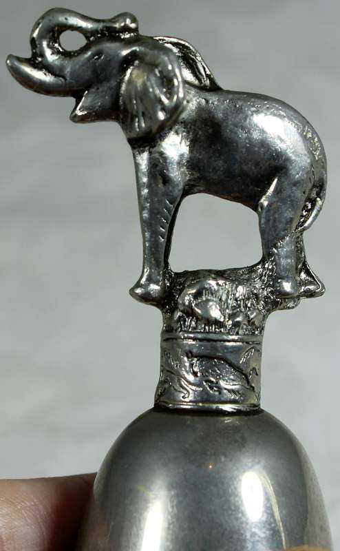 Silver plated bell with elephant figure
