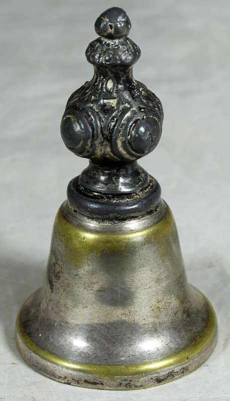 Silver plated bell with a wax seal metal top