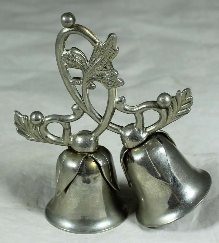 Silver plated bells on a branch