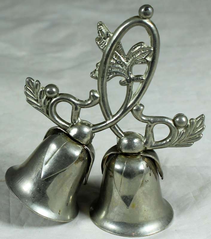Silver plated bells on a branch