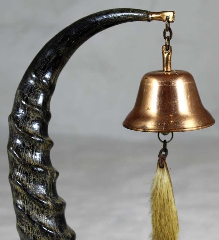 Composition horn and hide table bell