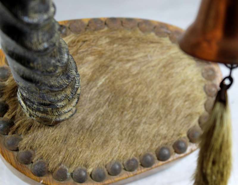 Composition horn and hide table bell