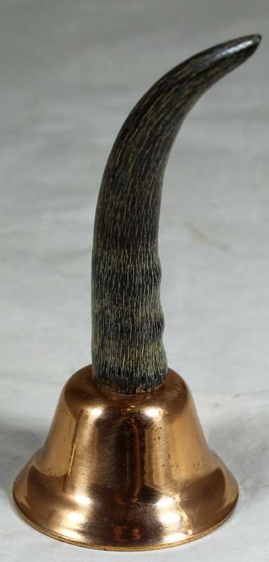 Copper bell with a horn