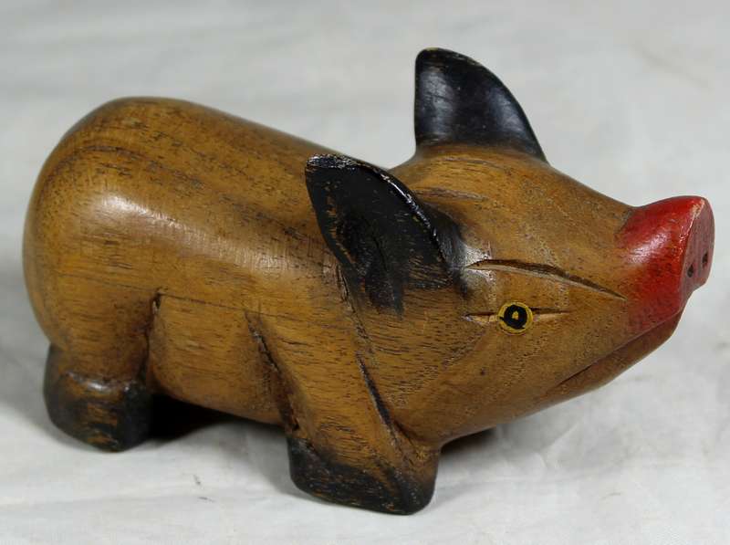 Carved wooden piggy