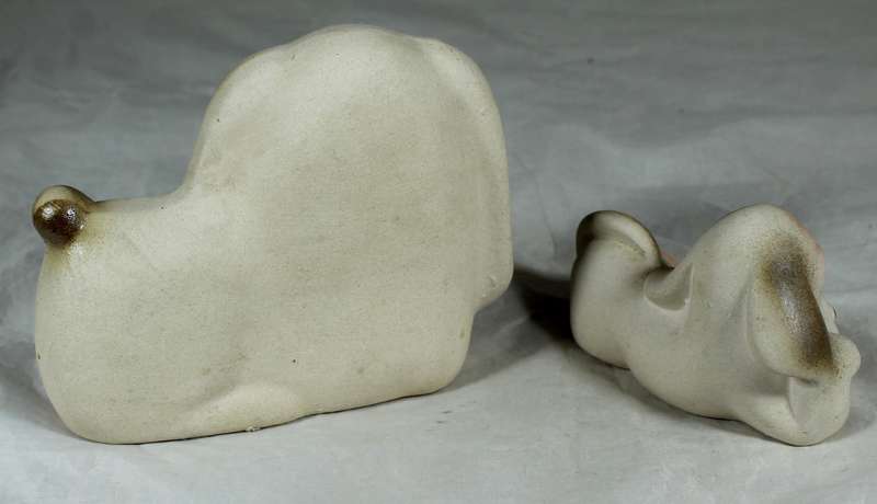 Pair of ceramic droopy eye dogs