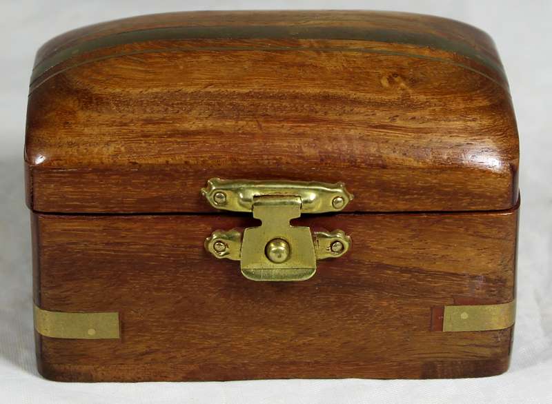 Small wooden box with brass inlay