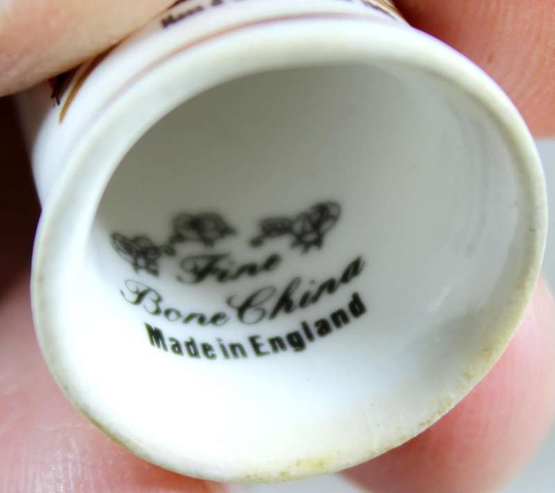 Bone China thimble - Moss & Woodd "Orion" 1905