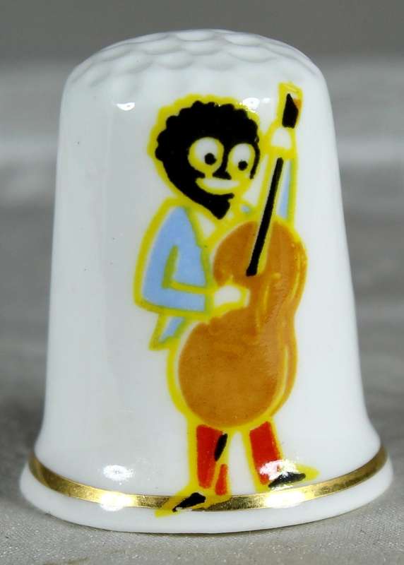 Bone China thimble - man playing a guitar