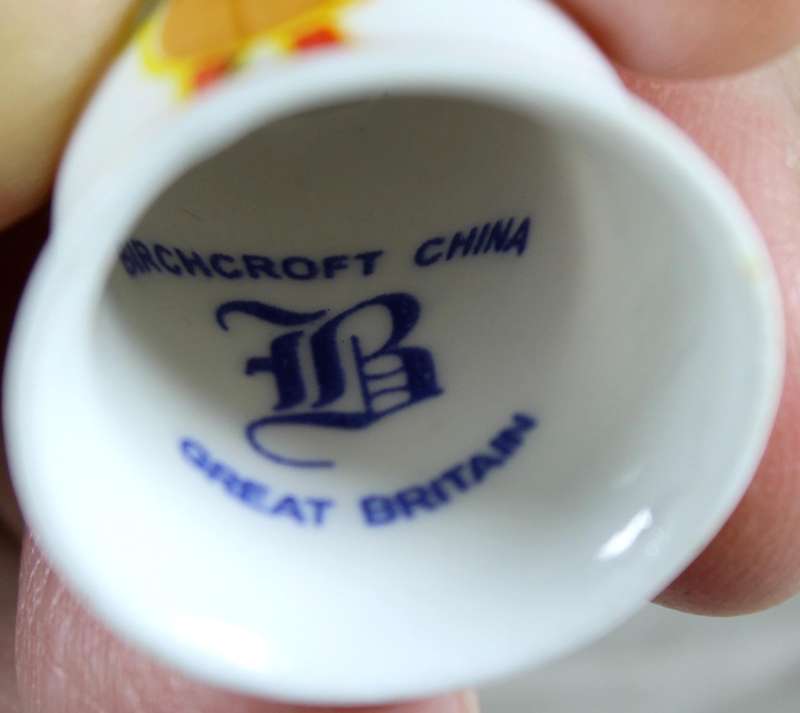 Bone China thimble - man playing a guitar