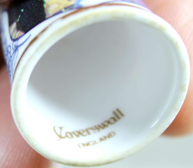 Bone China thimble - four generations of the House of Windsor - Caverswall